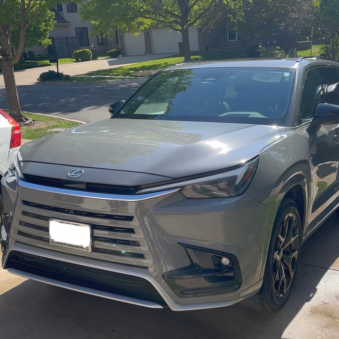 Pristine detailed car exterior showing glossy paint and clean finish